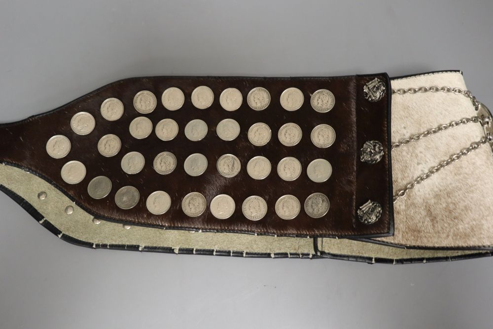 An Argentine horse-riders belt, ornamented with faux coins